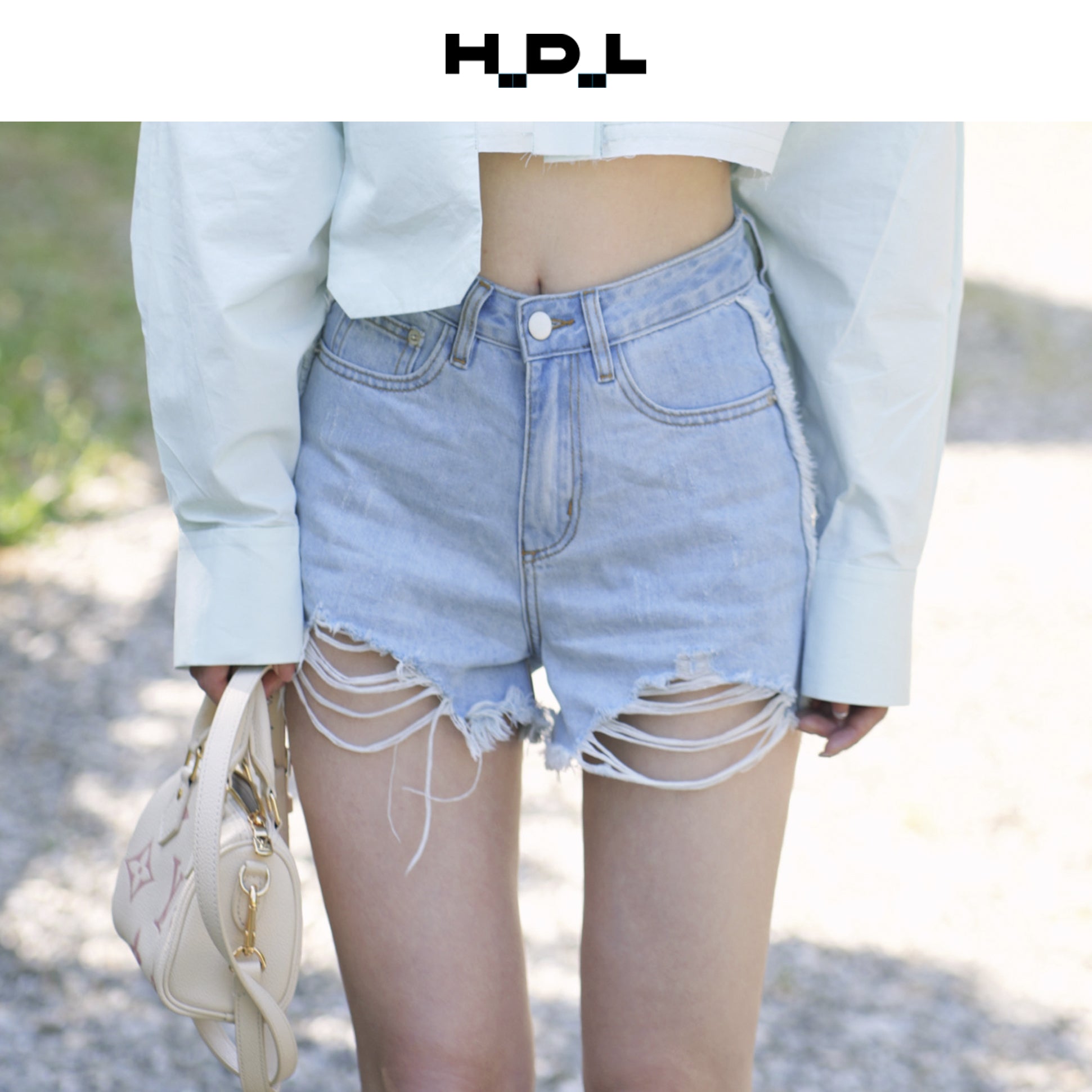 Ripped Low-Rise Denim Shorts