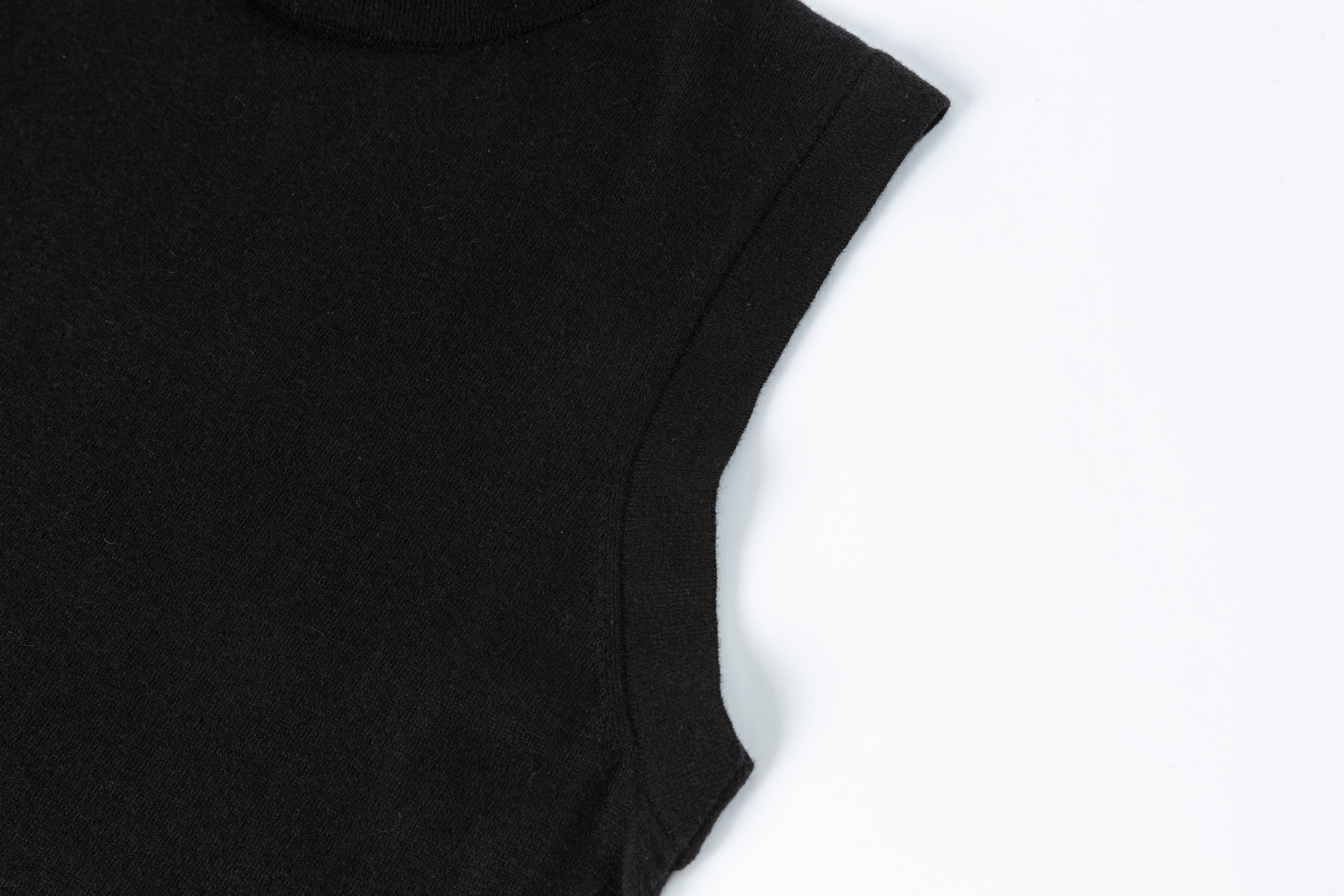 HDL Paire Flamma Black High Neck Asymmetric Sleeveless Knit Top